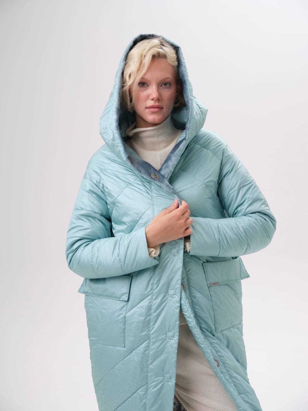 стеганое пальто с ассиметричным низом