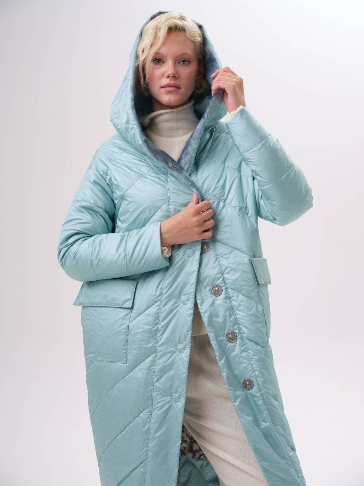 стеганое пальто с ассиметричным низом