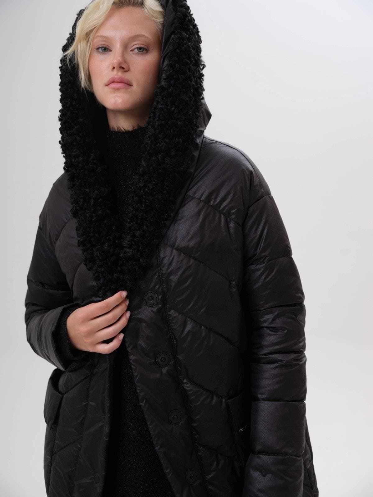 стеганое пальто с ассиметричным низом