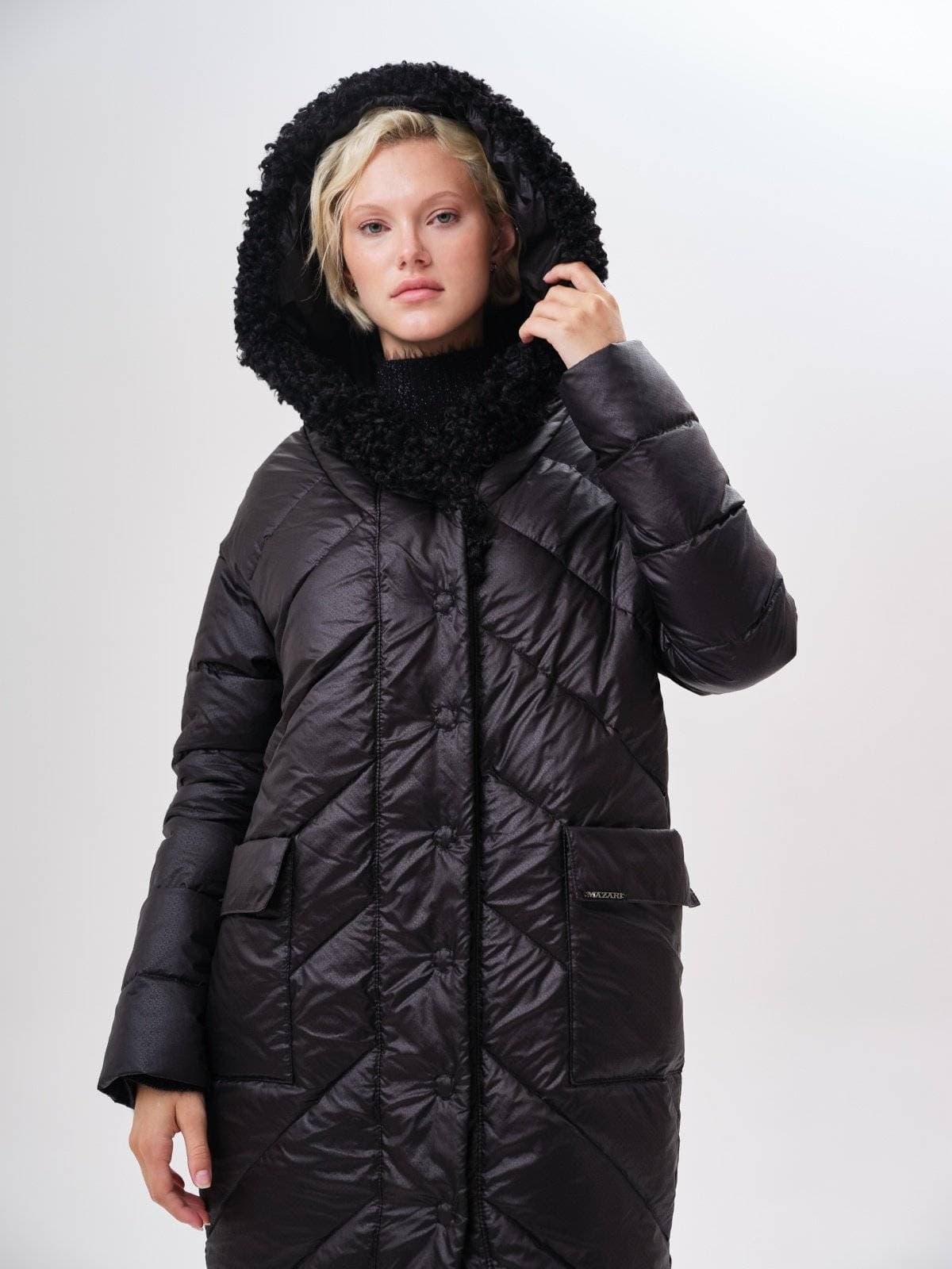 стеганое пальто с ассиметричным низом