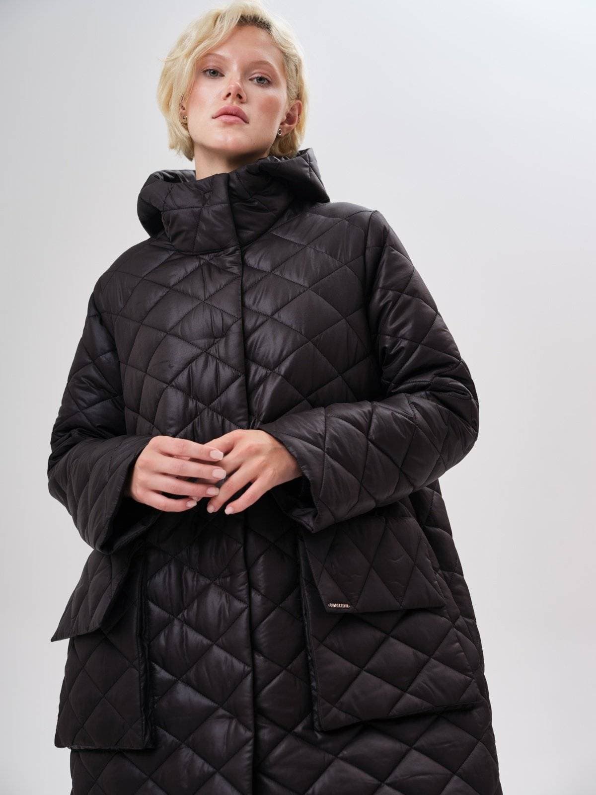 стеганое пальто с ассиметричным низом